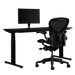 Herman Miller gaming bundle, featuring a Nevi sit-stand desk, Ollin monitor arm and a size B Aeron chair in onyx black.